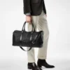 Bolsa de viaje mediana de piel granulada con abertura amplia Bolsa de viaje mediana de piel granulada con abertura amplia