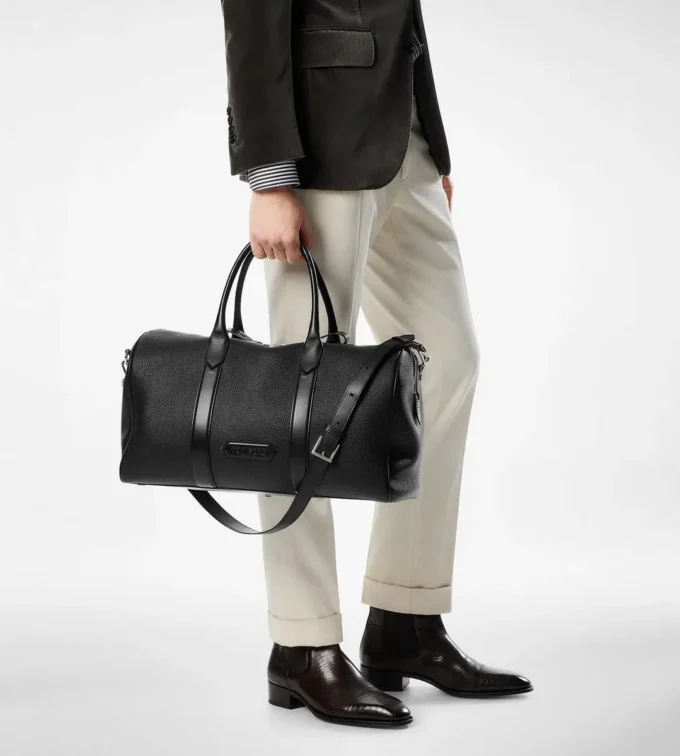 Bolsa de viaje mediana de piel granulada con abertura amplia Bolsa de viaje mediana de piel granulada con abertura amplia