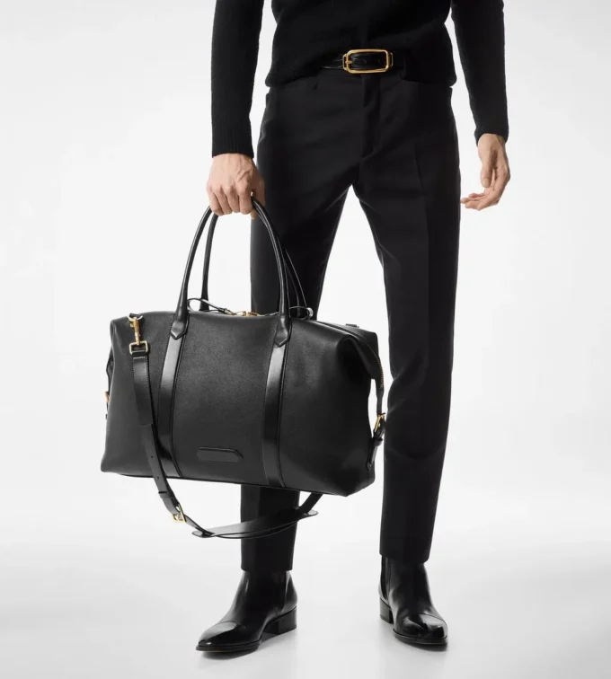 Bolso de viaje con hebilla lateral de piel lisa