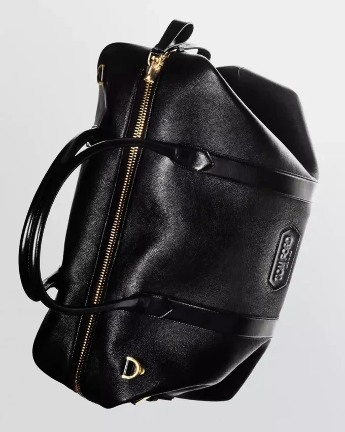 Bolso de viaje con hebilla lateral de piel lisa