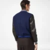 Bomber universitario con mangas de piel Bomber universitario con mangas de piel