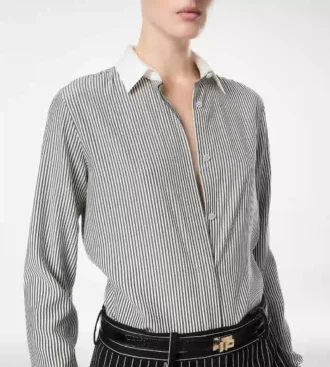 Camisa de seda a rayas con detalles en contraste