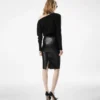 Falda de cuero con cremallera diagonal hasta la rodilla Falda de cuero con cremallera diagonal hasta la rodilla