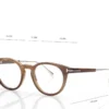 Gafas redondas de cuerno y titanio