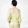 Jersey de cachemira con cuello en V y hombros descubiertos