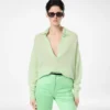 Jersey oversize de cuello polo abierto de cachemira y seda ultrasuaves