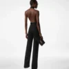 Mono con cuello halter y cinturón «Sable» Mono con cuello halter y cinturón «Sable»