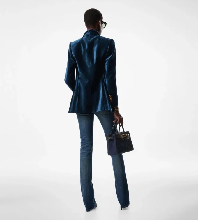 Pantalones acampanados de denim elástico sin tratar