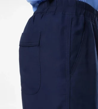 Pantalones ligeros de lyocell con pliegues para estar por casa