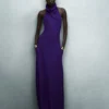 Vestido largo con cuello halter, bolsillos y espalda abierta Vestido largo con cuello halter, bolsillos y espalda abierta